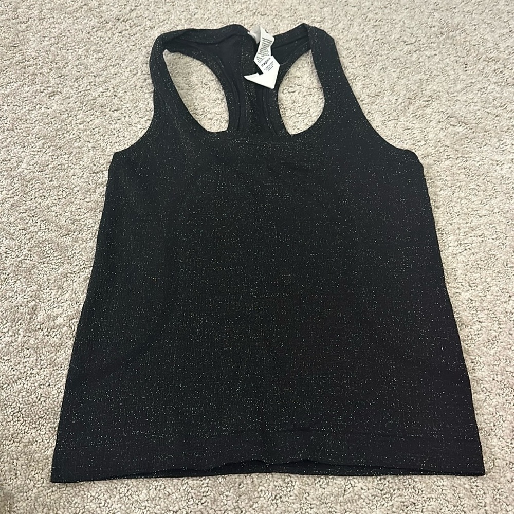 Excellent condition lululemon size 2 sparkly black racerback tank- race length.